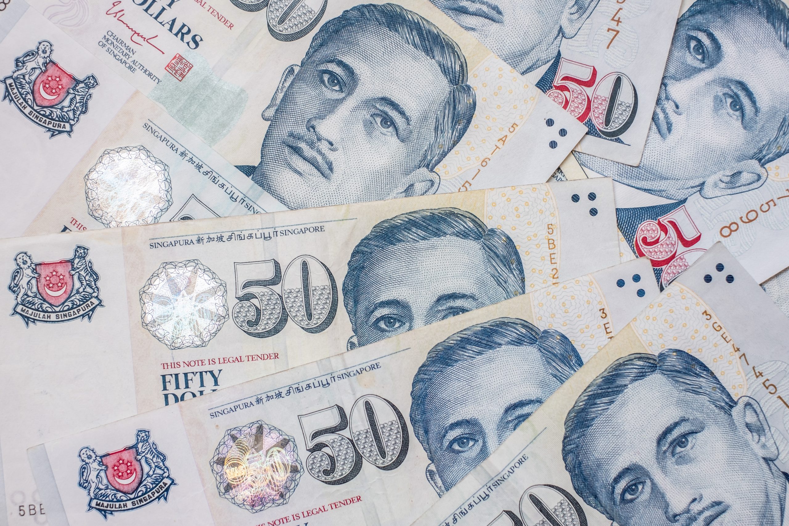 Singapore Mulls Raising Caps on E-Wallets